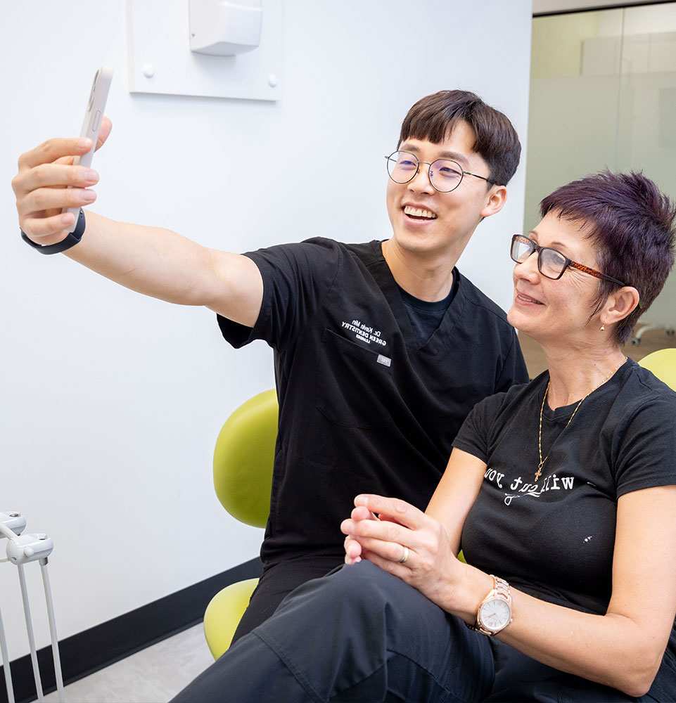 patient and doctor smiling together for a selfie